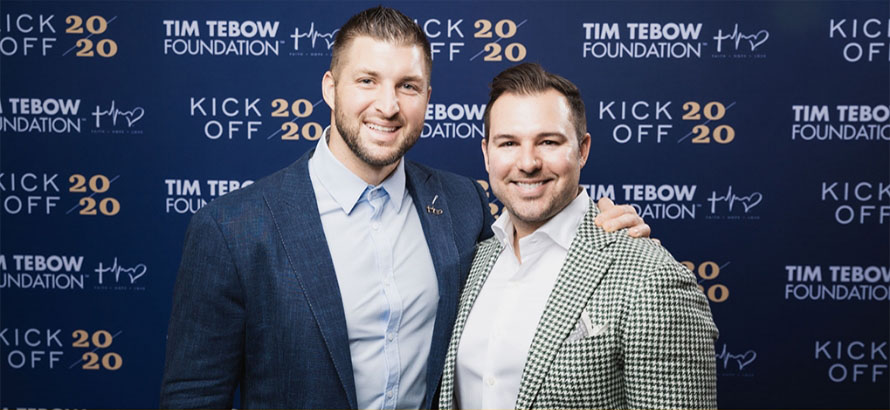 Abe with Tim Tebow